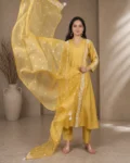 bhavini-mustard-yellow-white-embroidered-kurta-set-front-view-heritage-arch-location-festive-wear
