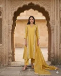 bhavini-mustard-yellow-white-embroidered-kurta-set-front-view-heritage-arch-location-festive-wear