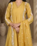 bhavini-mustard-yellow-white-embroidered-kurta-set-front-view-heritage-arch-location-festive-wear