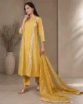 bhavini-mustard-yellow-white-embroidered-kurta-set-front-view-heritage-arch-location-festive-wear