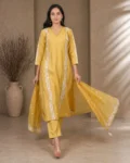 bhavini-mustard-yellow-white-embroidered-kurta-set-front-view-heritage-arch-location-festive-wear