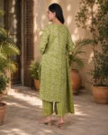 bhavini-olive-green-floral-print-suit-standingpose-livingroom-casualwear