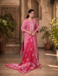 bhavini-fuchsia-white-tribal-pattern-salwar-set-elegant-pose-royal-courtyard-festivewear
