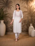 bhavini-white-pink-floral-kurta-walking-pose-terrace-garden-daywear