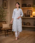 bhavini-white-blue-floral-print-kurta-elegant-pose-window-side-ethnicwear