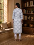 bhavini-white-blue-floral-print-kurta-elegant-pose-window-side-ethnicwear