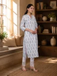 bhavini-white-blue-floral-print-kurta-elegant-pose-window-side-ethnicwear