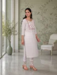 bhavini-white-pink-floral-kurta-walking-pose-terrace-garden-daywear
