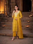 bhavini-mustard-botanical-print-salwar-set-side-pose-jungle-interior-daywear