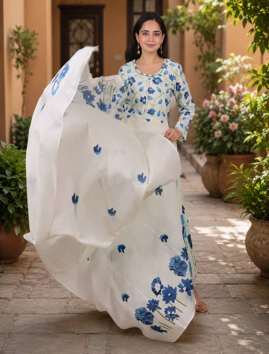 bhavini-white-blue-floral-print-maxi-dress-dupatta-motion-front-view-garden-courtyard-occasion-wear