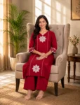 bhavini–crimson-red–floral-applique–kurta-set–dupatta-drape–front-view–garden-pathway–festive-wear
