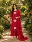 bhavini–crimson-red–floral-applique–kurta-set–dupatta-drape–front-view–garden-pathway–festive-wear