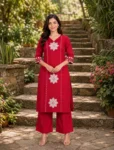 bhavini–crimson-red–floral-applique–kurta-set–dupatta-drape–front-view–garden-pathway–festive-wear